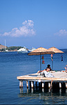 Turkey, bodrum, turbuku, turbuku village, coast, coasts, coastline, coastlines, water, umbrella, umbrellas, jetty, jetties, pier, piers, sea, seas, ocean, oceans, sunbathe, sunbather, sunbathers, sunbathing.