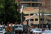 Men, Man, Male, Males, outdoors, occupation, occupations, cherry picker, cherry pickers, cherrypicker, cherrypickers, industry, electricity, electricity lines, power, power lines, cherry-picker, cherry-pickers, sydney, Australia, New South Wales, traffic.