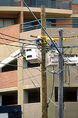 Men, Man, Male, Males, outdoors, occupation, occupations, cherry picker, cherry pickers, cherrypicker, cherrypickers, industry, electricity, electricity lines, power, power lines, cherry-picker, cherry-pickers, sydney, Australia, New South Wales.