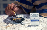 Man, Men, Male, Males, nicotine, cigarette, cigarettes, ashtray, ashtrays, tobacco, health hazard, health hazards, smoke, smokes, smoking, smoker, smokers, cancer, lung cancer, man smoking, men smoking, social issues, table, tables, hand, hands, sign, signs.