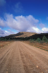 Road, roads, unsealed road, unsealed roads, dirt road, dirt roads, flinders ranges, flinders, range, ranges, Flinders Ranges NP, Flinders Ranges National Park, SA, South Australia, mountain, mountains, mountain range, mountain ranges, Australia, cloud, clouds, sky, skies, blue sky, blue skies, outback, australian outback, outback australia.