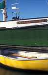 Transport, transportation, vehicle, vehicles, boat, boats, boating, moored boat, moored boats, watercraft, row boat, row boats, rowboat, rowboats, rowingboat, rowingboats, rowing boat, rowing boats, abrolhos, abrolhos pearl, port douglas, qld, queensland, australia, marina, marinas, sign, signs, marina, marinas.