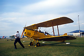 Australia, New South Wales, NSW, vintage plane, vintage planes, biplane, biplanes, bi-plane, bi-planes, transport, transportation, vehicle, vehicles, plane, planes, aircraft, aircrafts, tiger moth, tiger moths, blade, blades, propellor, propellors, man, men, male, males, outdoors, aeroplane, aeroplanes, light, airport, airports, aviation.