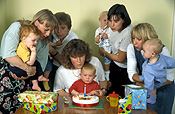 Baby, babies, people, child, children, infant, infants, woman, women, female, females, party, parties, birthday party, birthday, birthdays, birthday parties, present, presents, gift, gifts, cake, cakes, birthday cake, birthday cakes, candle, candles, table, tables, indoors, box, boxes, mother, mothers, parent, parents, parenting, parenthood, Australia, Sport pictures, Sports, balloon images, hot air balloons