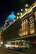 Australia, New South Wales, sydney, transport, transportation, vehicle, vehicles, bus, buses, queen victoria building, architecture, dome, domes, night, nightime, evening, evenings, road, roads, sealed road, sealed roads, window, windows, industry, retail, retail industry, retail shop, retail shops, shop, shops.