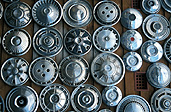 Transport, transportation, vehicle, vehicles, car, cars, vehicle, vehicles, hubcap, hubcaps, hub cap, hub caps, cap, caps.