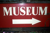 Sign, signs, museum, museums, arrow, arrows.