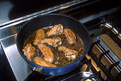 Food, chicken, fry, frying, frying pan, frying pans, stove, stoves, cooker, cookers, fried chicken, cook, cooks, cooking, kitchen, kitchens, fat, oil.