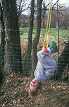 Child, children, people, girl, girls, female, females, swing, swings, swinging, outdoors.