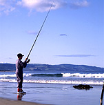 Australia, vic, victoria, apollo bay, fisherman, fishermen, fish, fishing, Sport pictures, Sports, surf fishing, beach fishing, beach, beaches, man, men, male, males, outdoors, people, hat, hats, shoreline, shorelines, seashore, seashores, coast, coasts, coastline, coastlines.