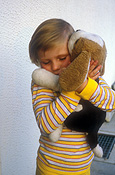 People, child, children, female, females, girl, girls, toy, toys, fluffy toy, fluffy toys, hugs, hugs, hugging, cuddle, cuddles, cuddling, embrace, embraces, embracing.