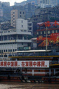 Asia, asian, china, river, rivers, yangzi, yangzi river, river yangzi, house, houses, housing, slum, slums, apartment, apartments, sign, signs.
