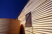 Australia, western australia, wa, goldfields, cottage, cottages, abandoned, iron, corrugated, corrugated iron, tank, tanks, water tank, water tanks, window, windows, rainwater, rainwater tank, rainwater tanks.