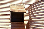 Australia, western australia, wa, goldfields, cottage, cottages, abandoned, iron, corrugated, corrugated iron, tank, tanks, water tank, water tanks, window, windows, rainwater, rainwater tank, rainwater tanks.