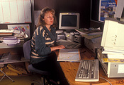 People, indoors, office, offices, woman, women, female, females, computer, computers, keyboard, keyboards, key, keys.