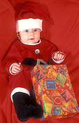 Christmas, christmas scene, christmas scenes, baby, babies, hat, hats, costume, costumes, infant, infants, infancy, child, children, people, present, presents, christmas present, christmas presents, gift, gifts, box, boxes, package, packages, Australia, Sport pictures, Sports, balloon images, hot air balloons