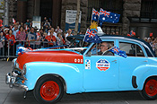 Australia, New South Wales, sydney, Anzac, Anzacs, Anzac Day, Anzac Days, parade, parades, tyre, tyres, Anzac Day parade, Anzac Day parades, Anzac Day March, transport, transportation, vehicle, vehicles, car, cars, holden, holden car, holden cars, fj, fj holden, fj holdens, people, crowd, crowds, flag, flags, australian flag, australian flags, hubcaps, hub cap, hub caps, cap, caps, driver, drivers.