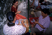 Asia, China, Yangshuo, guangxi, guangxi province, people, woman, women, female, females, cards, card game, card games, playing cards, outdoors.