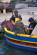 Malta, marsaxlokk, port, ports, harbour, harbours, net, nets, fishing net, industry, fishing, fishing nets, fisherman, fishermen, man, men, male, males, occupation, occupations, boat, boats, boating, fishing boat, fishing boats, water, wood, wooden.