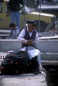 Malta, marsaxlokk, people, man, men, male, males, fishing, fisherman, fishermen, fishing net, fishing nets, net, nets.
