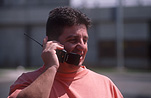 Man, Men, Male, Males, phone, phones, telephone, telephones, mobile phone, mobile phones, mobile, mobiles, communication, communicate, communicates, communicating, cell phone, cell phones, cell telephone, cell telephones, cellular, cellular phone, outdoors, cellular telephone, portrait, portraits, people.