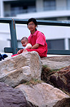 Family, Families, Parent, Parents, Parenting, Parenthood, people, child, children, daughter, daughters, girl, girls, female, females, mother, mothers, asian, asians, asian people, asian child, asian children, asian woman, asian women, rock, rocks, baby, babies, infant, infants, infancy, woman, women, outdoors.