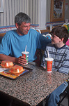 People, child, children, puberty, Family, Families, father, fathers, parent, parents, son, sons, boy, boys, male, males, teenager, teenagers, teenage boy, teenage boys, adolescent, adolescents, men, man, father and son, fathers and sons, macdonalds, macdonalds restaurant, macdonalds restaurants, restaurant, restaurants, food, people eating, child eating, children eating, table, tables, fast food, fast foods, fastfood, fastfoods, junkfood, junk food, junk foods, junkfood, junkfoods, Australia, Sport pictures, Sports, balloon images, hot air balloons