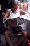 Asia, Asian, Southeast Asia, South East Asian, SE Asia, malaysia, read, reads, reading, newspaper, newspapers, paper, singlet, singlets, mens singlet, man, men, male, males, asian, asians, asian man, asian men, vest, vests, communications, media.