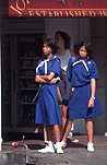 People, child, children, puberty, Asia, Asian, Southeast Asia, South East Asian, SE Asia, girl, girls, female, females, uniform, uniforms, school uniform, school uniforms, school child, school children, malaysia, bus stop, bus stops, teenager, teenagers, teenage girl, teenage girls.