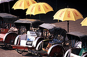 Asia, Asian, Southeast Asia, South East Asian, SE Asia, Malaysia, transport, transportation, vehicle, vehicles, trishaw, trishaws, sign, signs, umbrella, umbrellas.