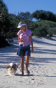 People, child, children, puberty, animal, animals, dog, dogs, domestic, domestic dog, domestic dogs, pet, pets, people, child, children, puberty, teenager, teenagers, teenage girl, teenage girls, girl, girls, female, females, adolescent, adolescents, outdoors, beach, beaches, sand, spaniel, spaniels, king charles, king charles spaniel, king charles spaniels, Royalty Free Image