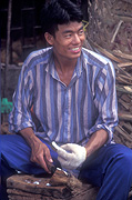 Asia, Asian, Southeast Asia, South East Asian, SE Asia, malaysia, man, men, male, males, fruit, coconut, coconuts, smile, smiles, smiling, happy, happiness.
