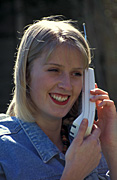 People, woman, women, female, females, phone, phones, telephone, telephones, communication, communicate, communicates, communicating, cordless telephone, cordless telephones, cordless phone, cordless phones, smile, smiles, smiling, Australia, Sport pictures, Sports, balloon images, hot air balloons