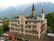 Europe, Switzerland, Swiss, Interlaken, architecture, hotel, hotels, hotel interlaken, interlaken hotel, balcony, balconies, window, windows, arch, arches, alp, alps, swiss alps, mountain, mountains, snow, snow scene, snow scenes, winter, cold.