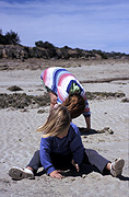 People, child, Children, girl, girls, female, females, girl, girls, beach, beaches, coast, coasts, coastal, coastline, coastlines, sand, outdoors.