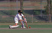 Sport pictures, Sports, swing, swings, cricket, cricket game, cricket games, cricket match, cricket matches, people, boy, boys, male, males, cricket bat, cricket bats, cricket ball, cricket balls, hat, hats, baseball hat, baseball hats, cap, caps.