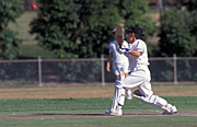 Sport pictures, Sports, swing, swings, cricket, cricket game, cricket games, cricket match, cricket matches, people, boy, boys, male, males, cricket bat, cricket bats, cricket ball, cricket balls, hat, hats, baseball hat, baseball hats, cap, caps.