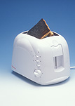 Toaster, toasters, toast, burnt, burnt toast, burnt bread, bread, sliced bread, electrical appliance, electrical appliances, kitchen appliance, kitchen appliances, consumer product, consumer products, Royalty Free Image