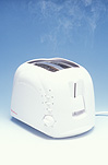 Toaster, toasters, toast, burnt toast, burnt bread, electrical appliance, electrical appliances, kitchen appliance, kitchen appliances, smoke, toast burning, Royalty Free Image