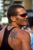People, man, men, male, males, tattoo, tattoos, tattooing, skin, singlet, singlets, sunglasses, portrait, portraits, australia.