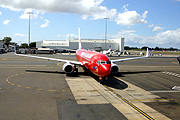 Australia, New South Wales, sydney, sydney airport, airport, airports, transport, transportation, vehicle, vehicles, plane, planes, aircraft, aircrafts, aeroplane, aeroplanes, virgin, virgin blue, sign, signs, advertise, advertises, advertising.