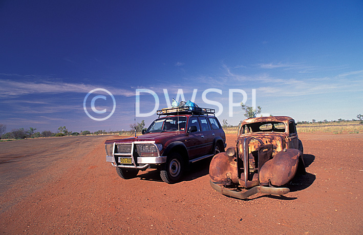 stock photo image: Australia, transport, transportation, vehicle, vehicles, four-wheel drive, four-wheel drives, 4wd, 4wds, four wheel drive, four wheel drives, car, road, roads;unsealed, unsealed road, unsealed roads, dirt, dirt road, dirt roads, cars, vehicle, vehicles, dumped car, dumped cars, abandoned car, abandoned cars, pollution, rust, rusting, rusted, Australi, desert, deserts, australian, outback, australian outback, outback australia, desert, deserts.