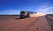 Transport, transportation, vehicle, vehicles, Truck, Trucks, road train, roadtrain, heavy vehicle, heavy vehicles, roadtrains, road trains, Australia, NT, Northern Territory, dust, road, roads, outback road, outback roads, dirt roads, unsealed, unsealed road, unsealed roads.