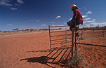 Australia, Australian, Australian desert, Australian deserts, shadow, shadows, Man, Men, Male, Males, people, Fence, Fences, desert, deserts, desert scenes, outback, australian outback, outback australia, NT, Northern Territory, Australia, hat, hats, outdoors.