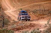 Transport, transportation, vehicle, vehicles, Car, Cars, Vehicle, Vehicles, australian outbackoutback road, road, roads, unsealed, unsealed road, unsealed roads, dirt road, dirt roads, track, tracks, four-wheel drives, four wheel drive, four wheel drives, 4wds, 4-wds, dirt road, dirt roads, unsealed, unsealed road, unsealed roads, NT, Northern Territory, Australia, chambers pillar, pillar, pillars, rock, rocks.